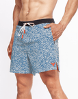 Flow shorts in ocean blue with moisture-wicking fabric, ideal for hot yoga and workouts.