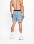 Flow shorts in ocean blue, designed for hot yoga, featuring moisture-wicking and quick-drying materials.